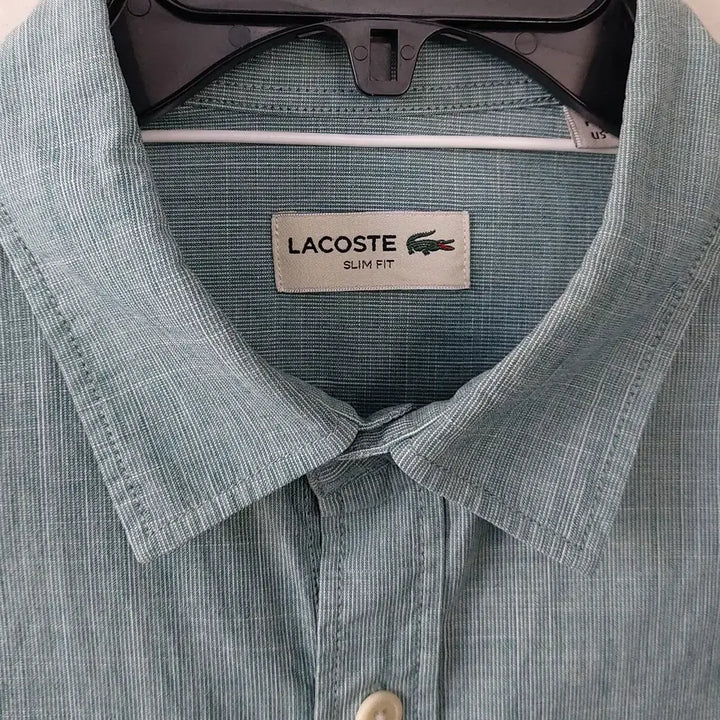[SOLD OUT] 라코스테 L/105 슬림핏 슬럽 포켓 셔츠. MG. A