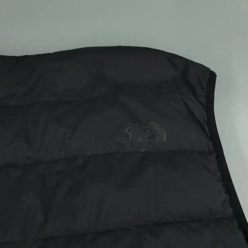 [BUNJANG] The North Face Black Tone-on-Tone Logo Superlight Duck Down Vest / 노스페이스 블랙 톤톤 로고 슈퍼라이트 덕다운 오리털 경량 패딩조끼 패딩베