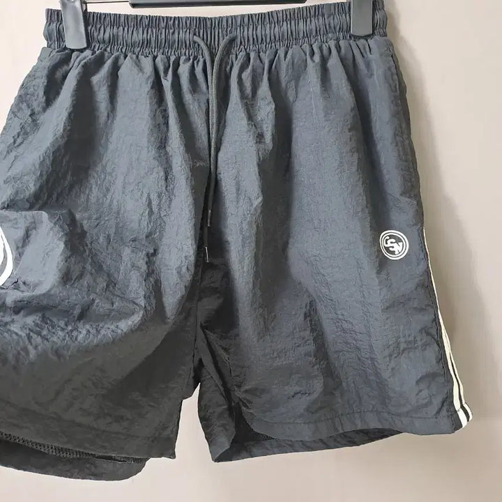 [BUNJANG] COMSONNOT Black Windbreaker Two-Line Shorts / COMSONNOT 바람막이 블랙 2선 반바지