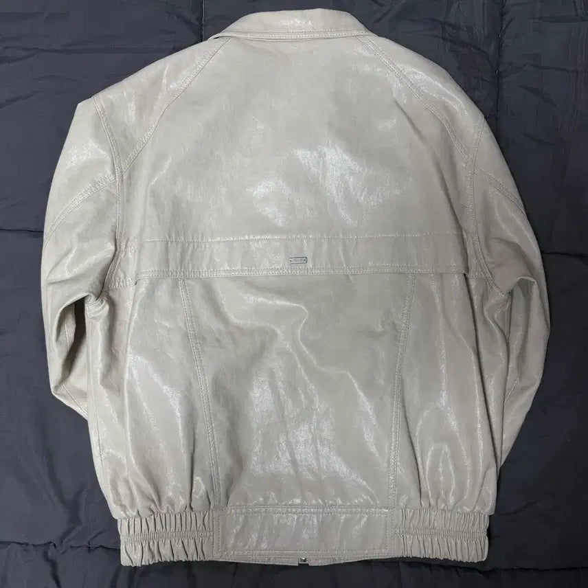 [SOLD OUT] 루에브르 어시메트릭 플라켓 폭스 레더 자켓 베이지