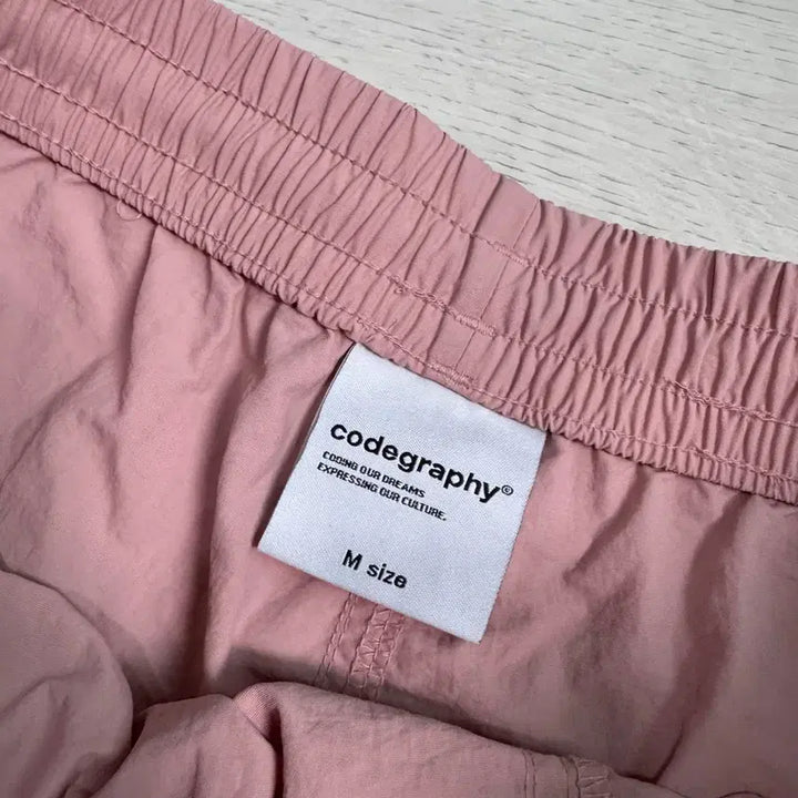 [SOLD OUT] M 코드그라피 나일론 반바지