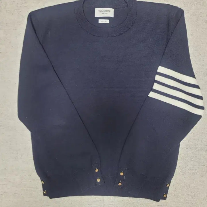 [SOLD OUT] (25년12월구매시착1회구매내역0)톰브라운 밀라노스티치 금장 니트