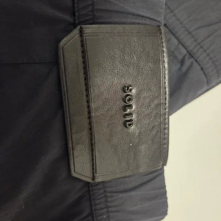 [BUNJANG] Solid Homme 24FW One-Tuck Nylon Semi-Wide Banding Pants / 솔리드옴므 24FW 원턱 나일론 세미와이드 밴딩 팬츠 50