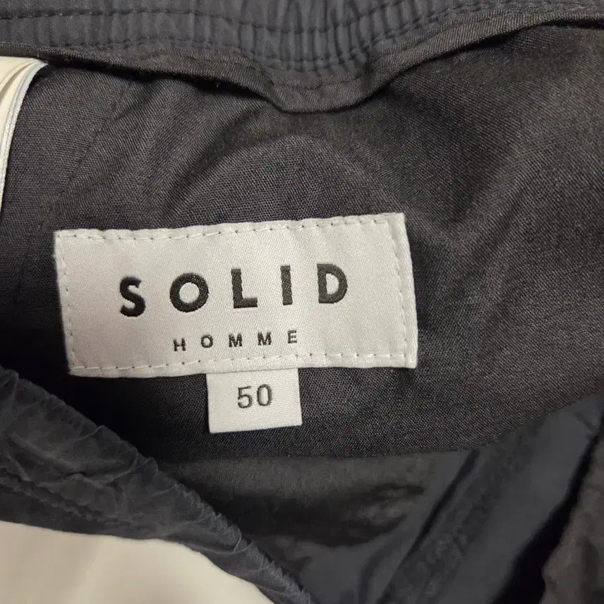 [BUNJANG] Solid Homme 24FW One-Tuck Nylon Semi-Wide Banding Pants / 솔리드옴므 24FW 원턱 나일론 세미와이드 밴딩 팬츠 50