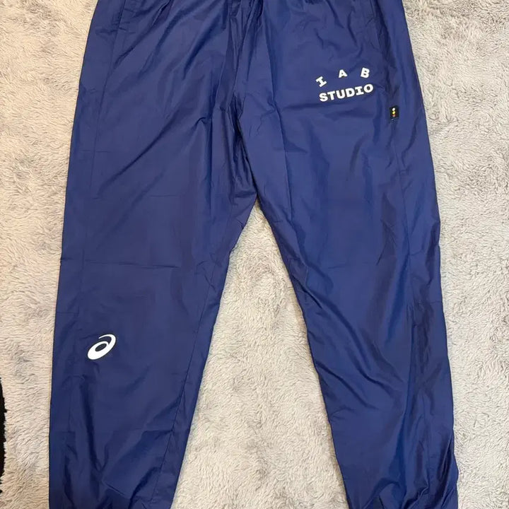 [BUNJANG] IAB Studio x ASICS Navy Woven Pants / IAB x 아식스 네이비 우븐 팬츠