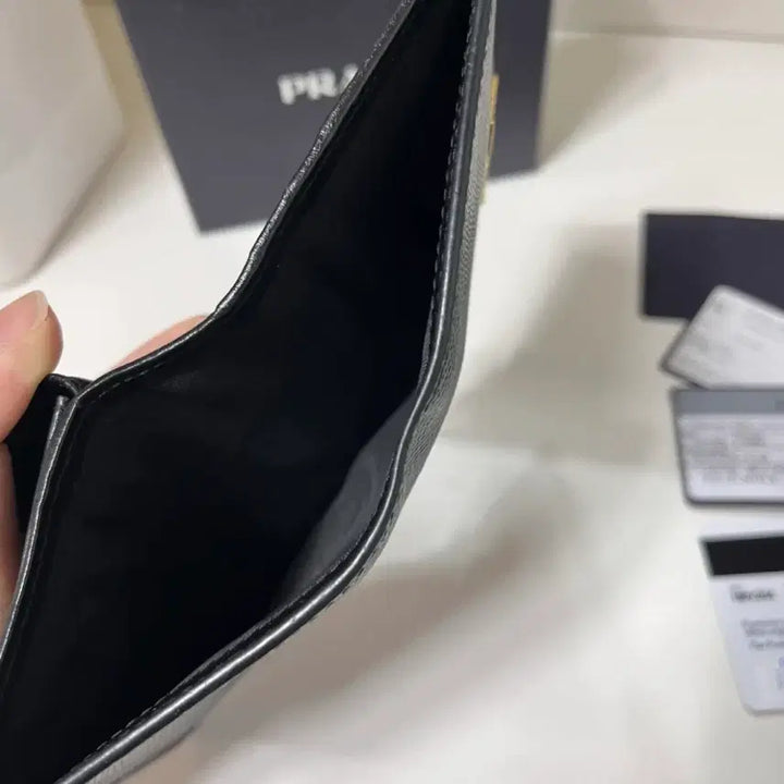[BUNJANG] Prada Saffiano Metal Logo Bi-fold Wallet Black / 프라다 사피아노 메탈 로고 반지갑 블랙