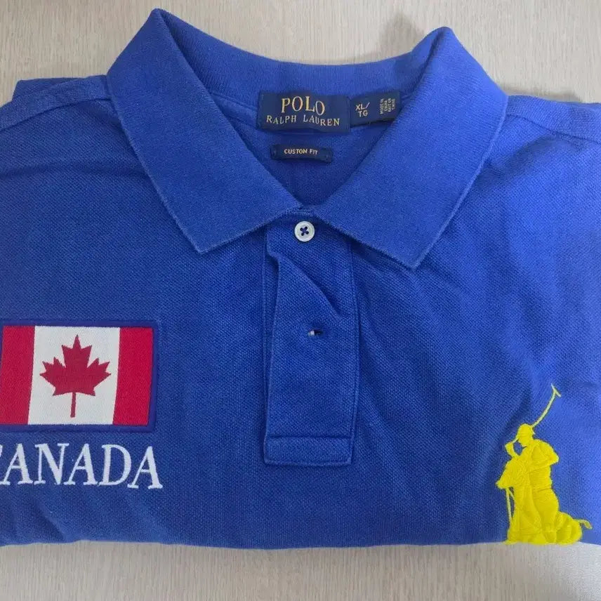 [BUNJANG] Polo Ralph Lauren Canada Flag Patch Short Sleeve Polo Shirt / 폴로 랄프로렌 캐나다 반팔 카라티 블루 xl