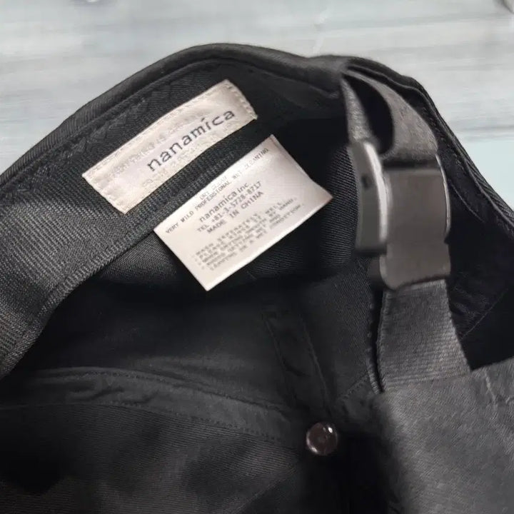 [SOLD OUT] 나나미카 치노 로고 자수 볼캡 블랙