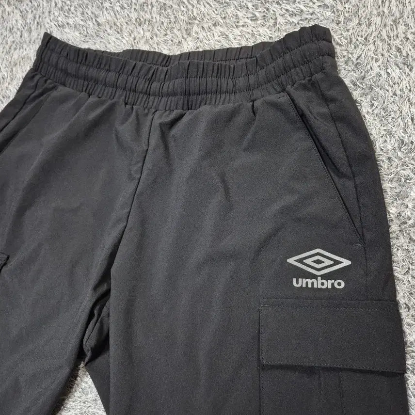 [SOLD OUT] 엄브로 여성 우븐 카고 조거팬츠 65(XS)