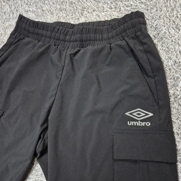 [SOLD OUT] 엄브로 여성 우븐 카고 조거팬츠 65(XS)