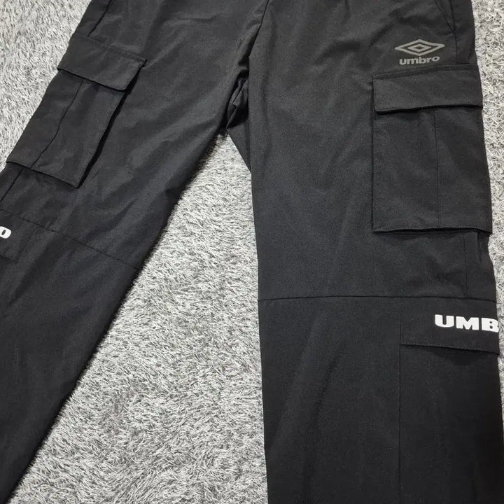 [SOLD OUT] 엄브로 여성 우븐 카고 조거팬츠 65(XS)