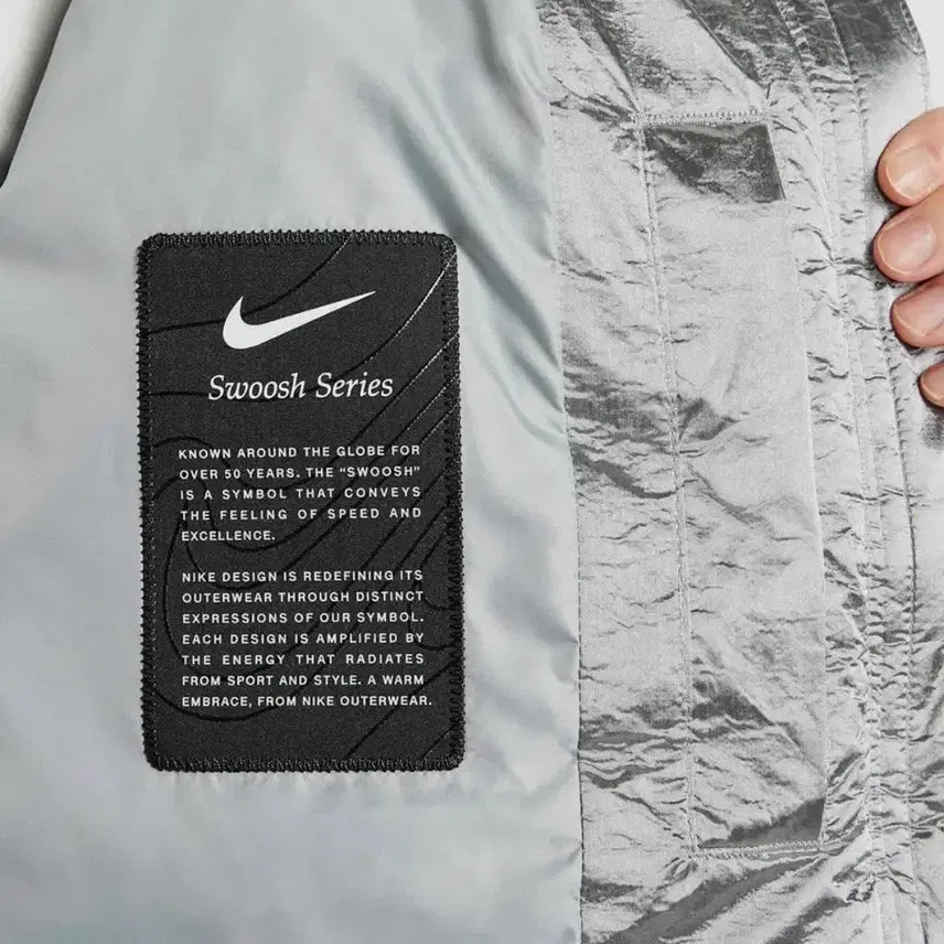[BUNJANG] Nike Swoosh Therma-FIT Oversized Down Padded Jacket Silver / [새상품] 나이키 스우시 써마핏 오버사이즈 다운패딩 실버 75(XS)