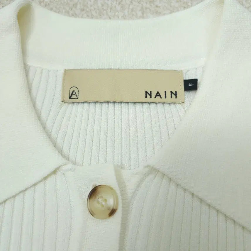 [BUNJANG] NAIN Ivory Slim-Fit Collar Knit Top / (F)NAIN 여성 카라 반팔 니트 슬림핏 아이보리 W3098