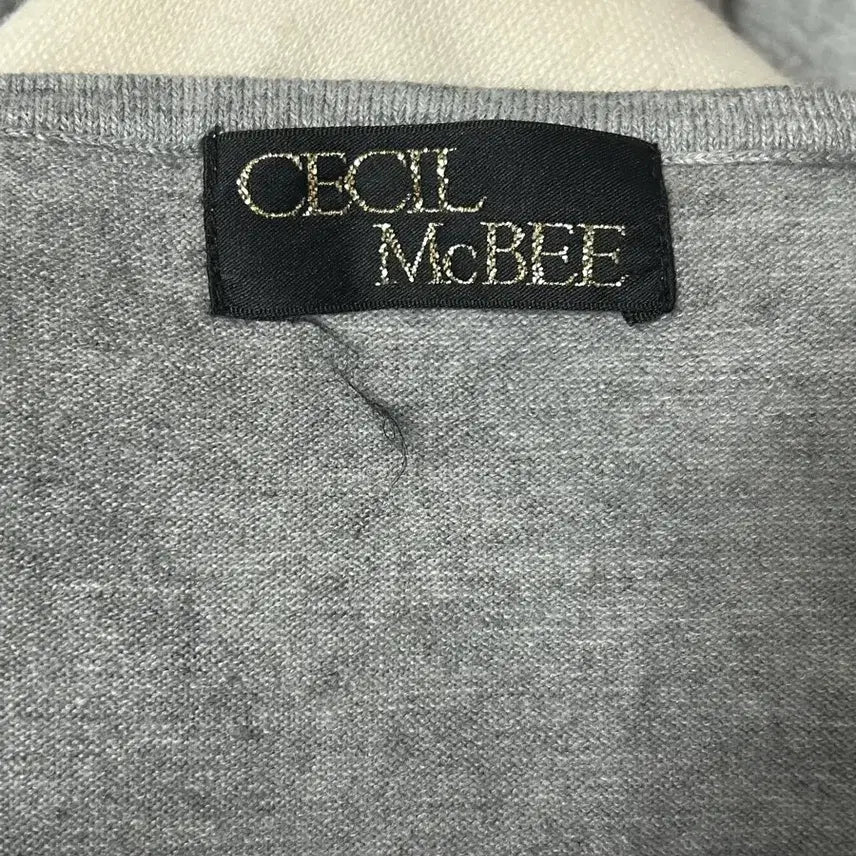 [BUNJANG] Cecil McBee Grey Big Ribbon Royal Rib Top / 세실맥비 그레이 왕리본 로걀탑