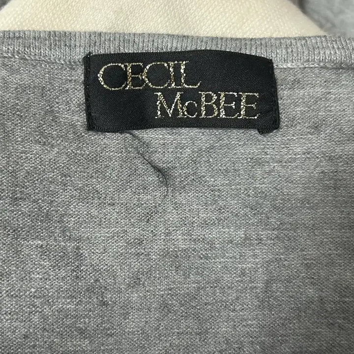 [BUNJANG] Cecil McBee Grey Big Ribbon Royal Rib Top / 세실맥비 그레이 왕리본 로걀탑