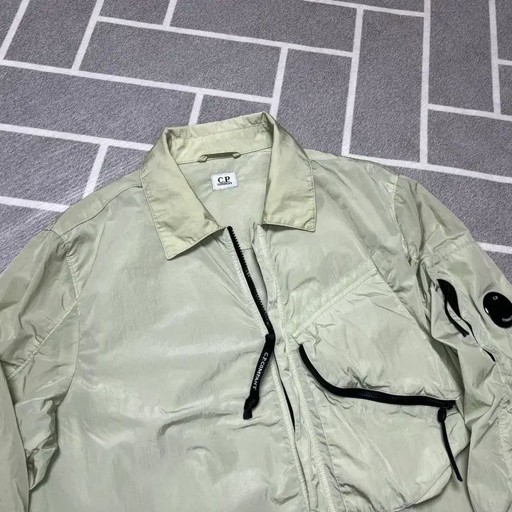 [SOLD OUT] CP컴퍼니 렌즈와펜로고 나일론 오버셔츠 자켓 바람막이