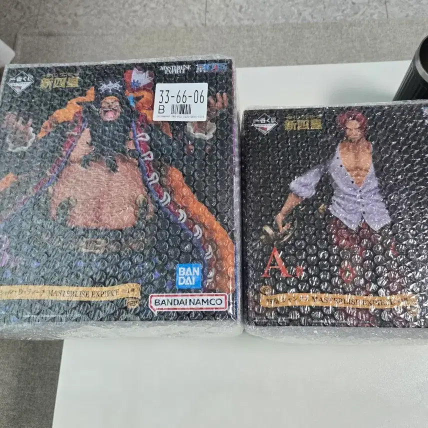 [SOLD OUT] (미개봉,최저가)원피스 제일복권 신사황 샹크스,티치 일괄