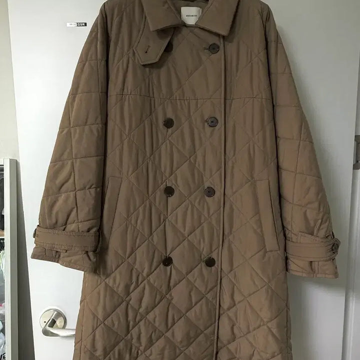 [BUNJANG] Shesmiss Quilted Long Padding (Milk Brown) / [쉬즈미스] 퀄팅 허리 롱패딩 (밀크브라운)