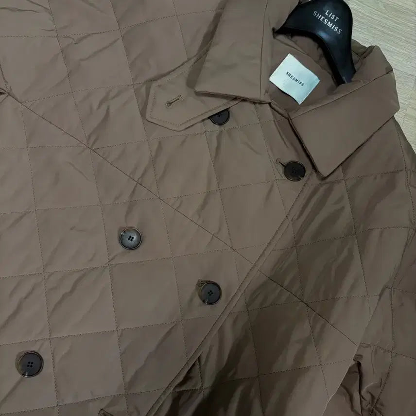 [BUNJANG] Shesmiss Quilted Long Padding (Milk Brown) / [쉬즈미스] 퀄팅 허리 롱패딩 (밀크브라운)