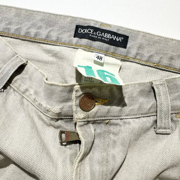 [SOLD OUT] [32-33,매장판] 돌체 앤 가바나 메탈 플레이트 디스트레스드 데님팬츠
