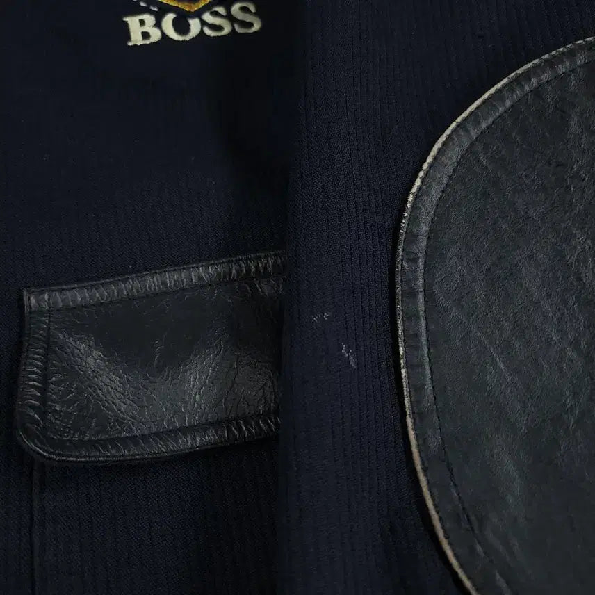 [BUNJANG] Suntory Boss Coffee Leather Shoulder Patch Jacket / 산토리 보스커피 JP 블랙 네이비 배색 로고 소가죽 카우레더 숄더패치 엘