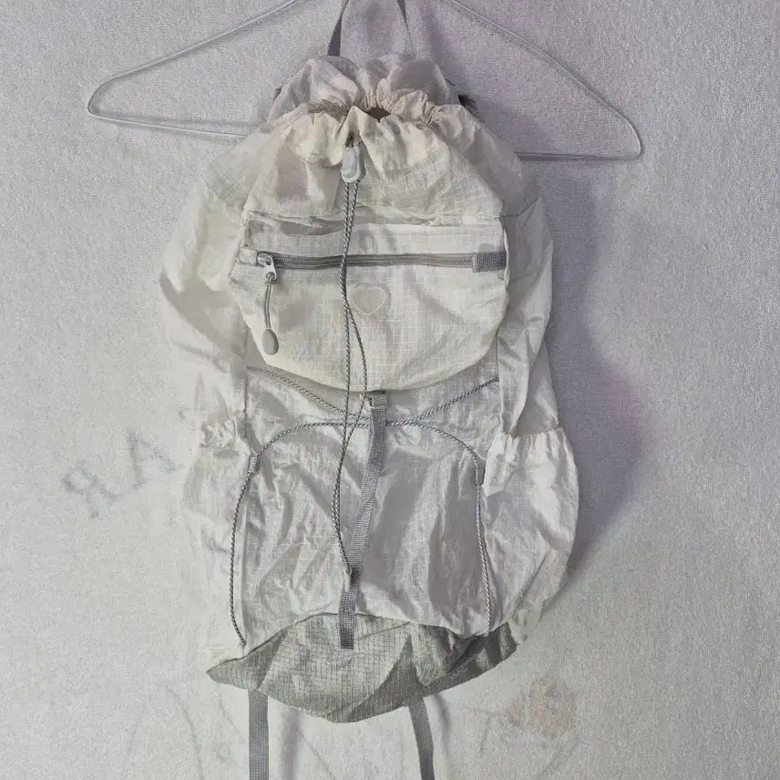 [SOLD OUT] 페넥 화이트 시스루 드로우스트링 백팩