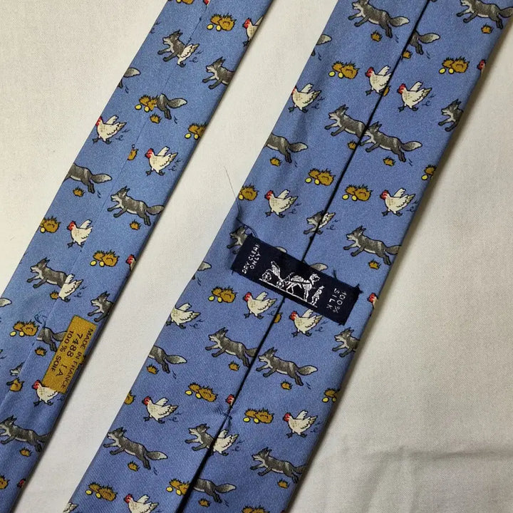 [BUNJANG] Hermes Sky Blue Fox and Chicken Pattern Silk Tie / 에르메스 스카이블루 여우 닭패턴 실크 넥타이