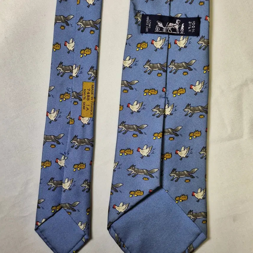 [BUNJANG] Hermes Sky Blue Fox and Chicken Pattern Silk Tie / 에르메스 스카이블루 여우 닭패턴 실크 넥타이