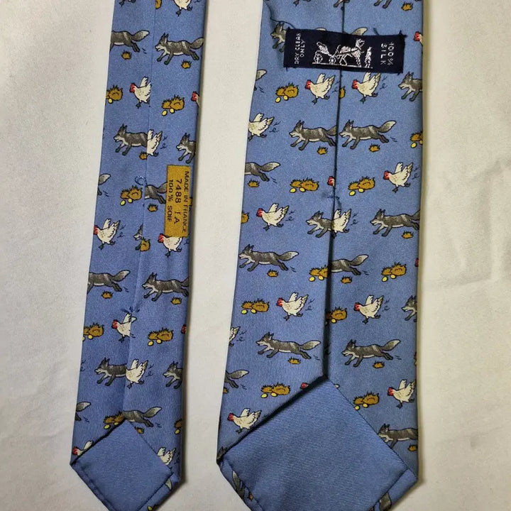 [BUNJANG] Hermes Sky Blue Fox and Chicken Pattern Silk Tie / 에르메스 스카이블루 여우 닭패턴 실크 넥타이
