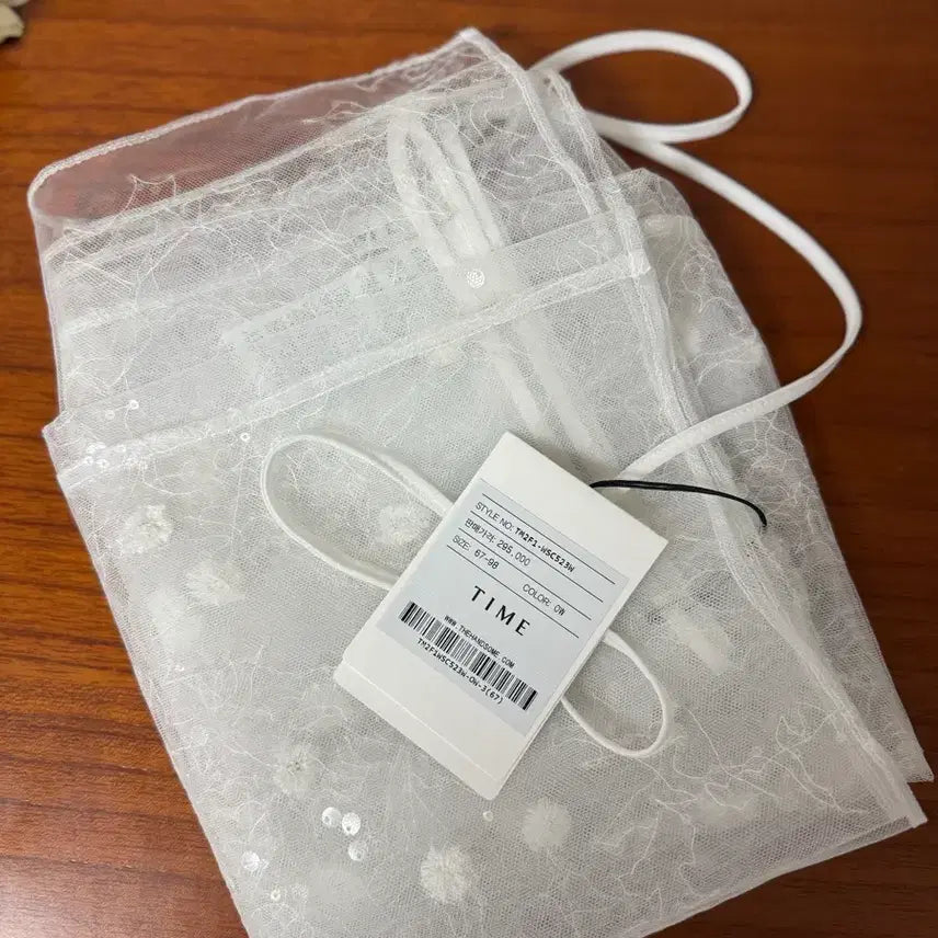 [SOLD OUT] 타임 튤 시퀸 랩 스커트