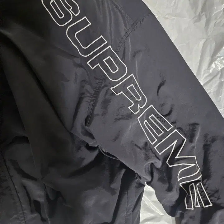 [SOLD OUT] 슈프림 스펠아웃 트랙자켓 23FW 블랙 M