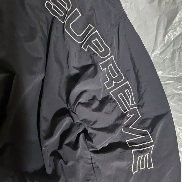 [SOLD OUT] 슈프림 스펠아웃 트랙자켓 23FW 블랙 M