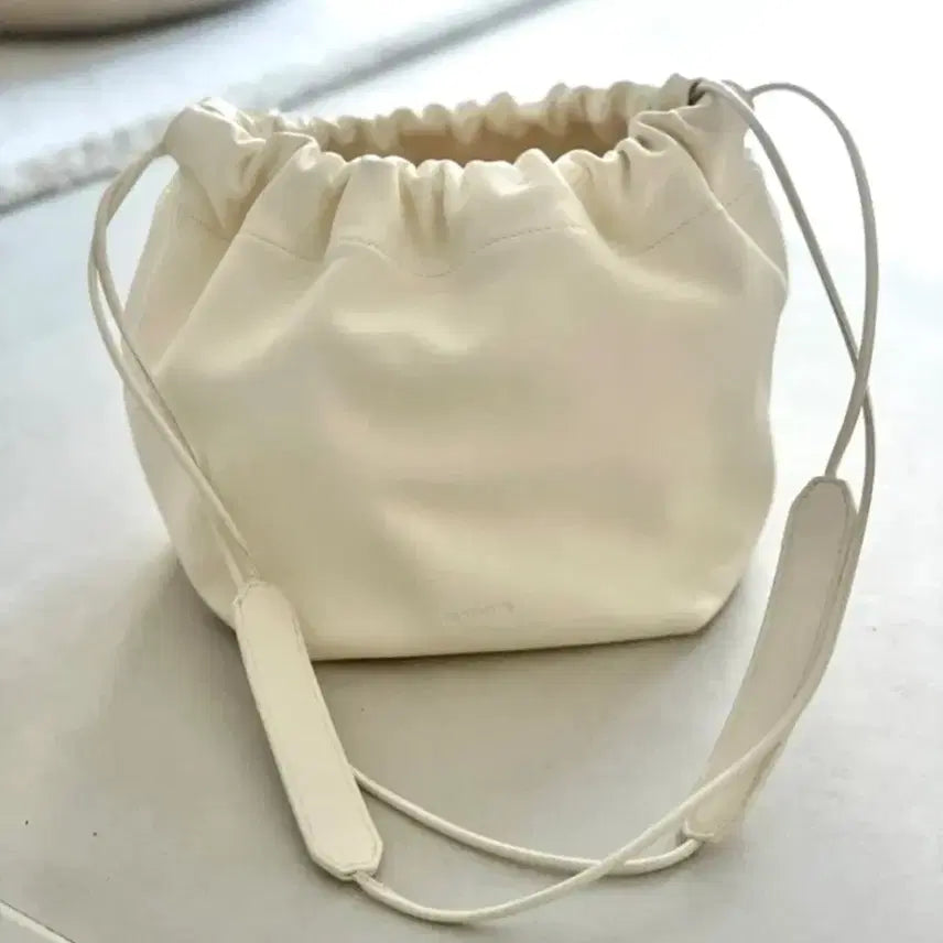 [SOLD OUT] (정품) 질샌더 덤플링 드로우스트링 버킷백