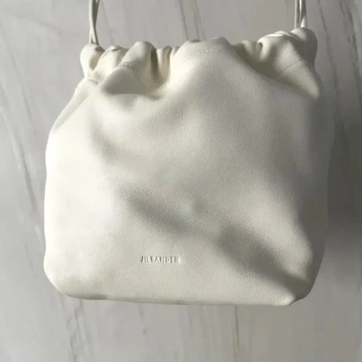 [SOLD OUT] (정품) 질샌더 덤플링 드로우스트링 버킷백