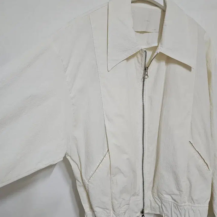 [BUNJANG] Unene Lightweight Windbreaker Jacket / unene 바스락 점퍼