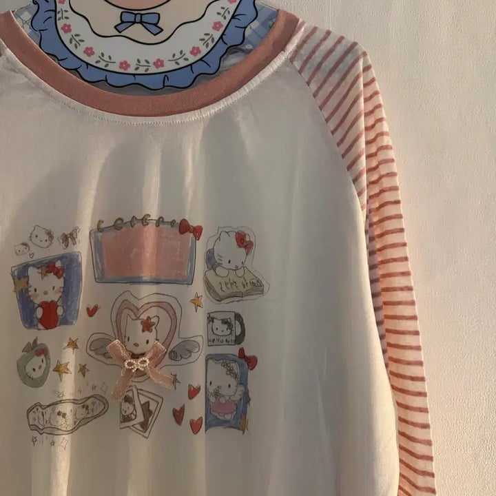 [BUNJANG] Kitty Ribbon Striped Long Sleeve Vintage Tee / 키티 리본 스트라이프 긴팔티 빈티지