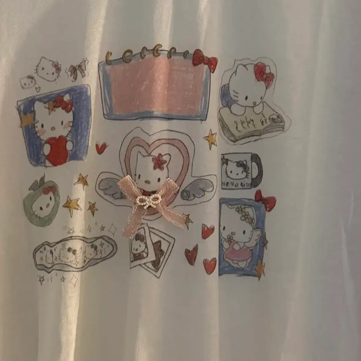 [BUNJANG] Kitty Ribbon Striped Long Sleeve Vintage Tee / 키티 리본 스트라이프 긴팔티 빈티지
