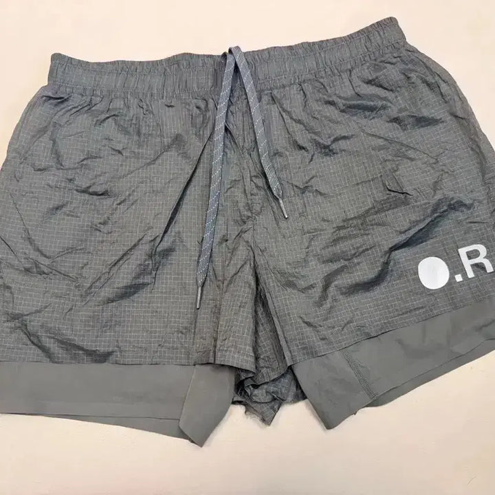 [BUNJANG] Optimistic Runners Glossy Ripstop Shorts Metallic Grey / 옵티미스틱 러너스 글로시 립스탑 쇼츠  판매