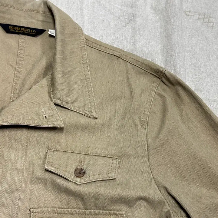 [SOLD OUT] 유니폼브릿지 베이지 사파리 유틸리티 자켓 XL