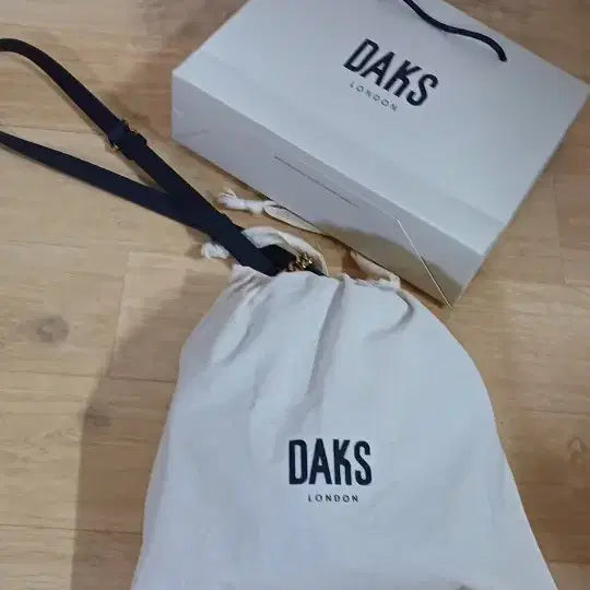 [BUNJANG] Daks Leather Quilted Tassel Round Crossbody Bag / 닥스 소가죽 퀼팅 태슬 라운드 크로스백