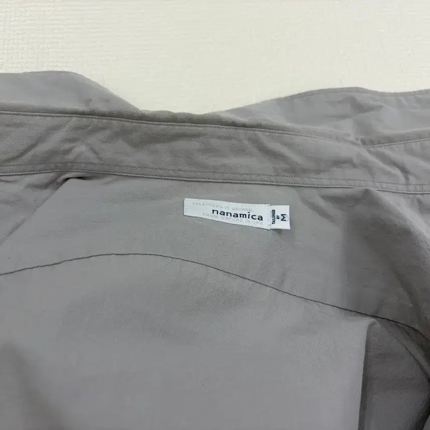 [SOLD OUT] [M] 나나미카 레귤러 카라 윈드셔츠 그레이