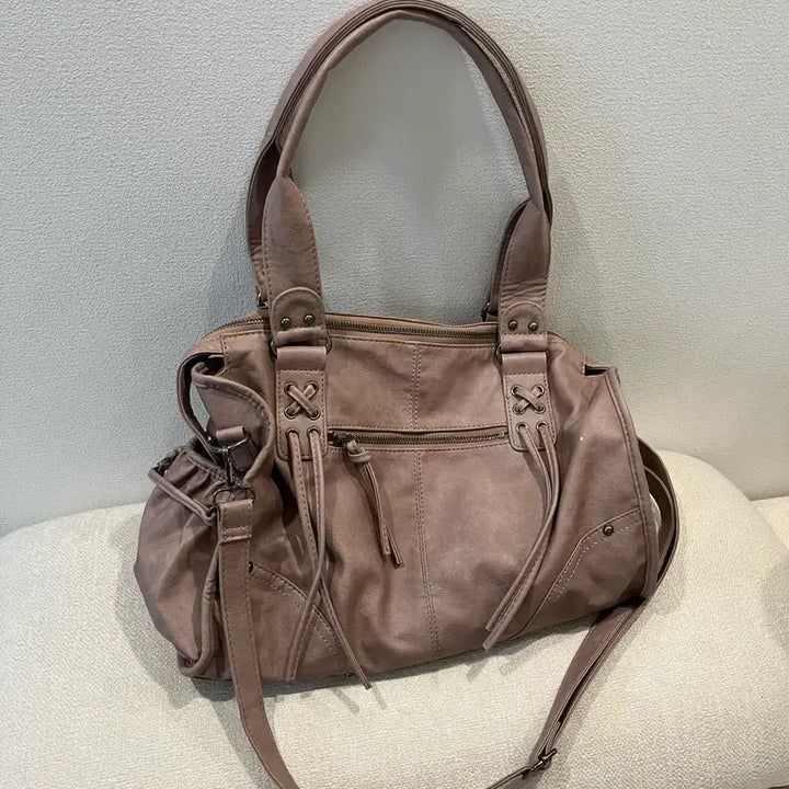 [SOLD OUT] 팬시클럽 벨티드 워싱 레더백 (BABY PINK) F25QE990