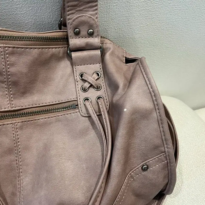 [SOLD OUT] 팬시클럽 벨티드 워싱 레더백 (BABY PINK) F25QE990