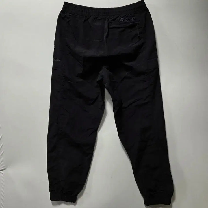 [BUNJANG] Discovery Black Woven Training Pants / 디스커버리 블랙 우븐 트레이닝 팬츠 32 26042413