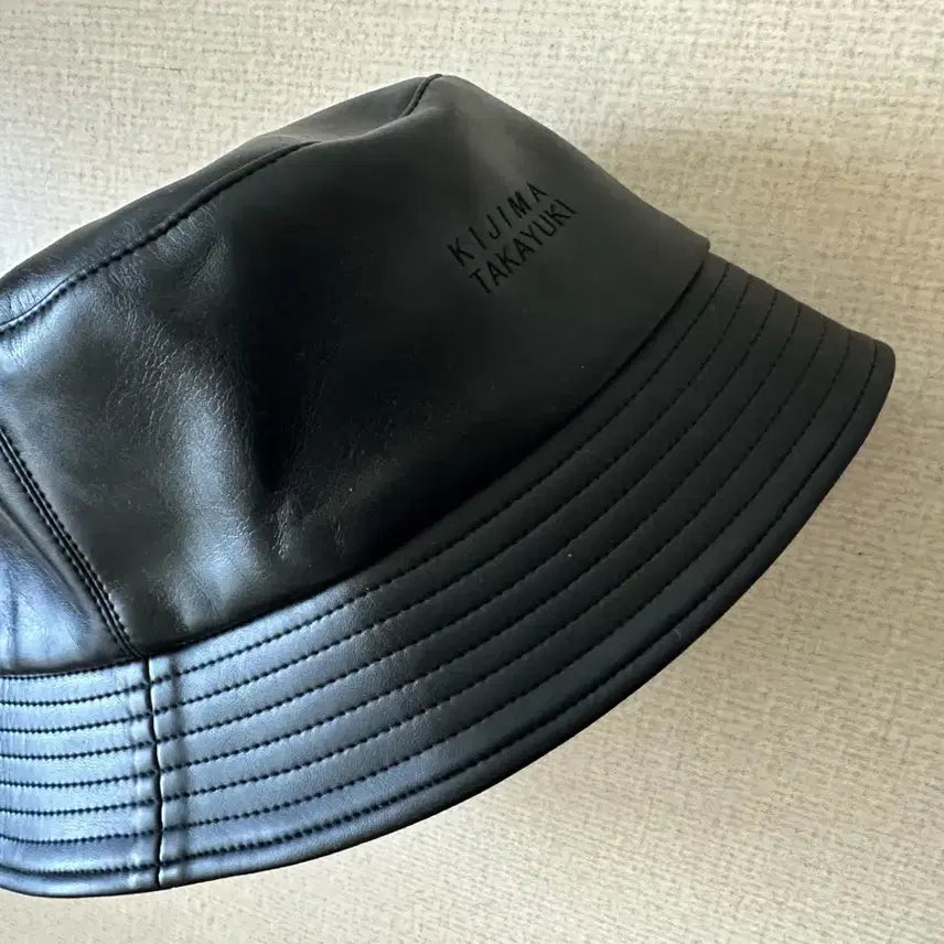 [BUNJANG] KIJIMA TAKAYUKI Synthetic Leather Bucket Hat / 키지마 타카유키(KIJIMA TAKAYUKI) 레더 버킷햇