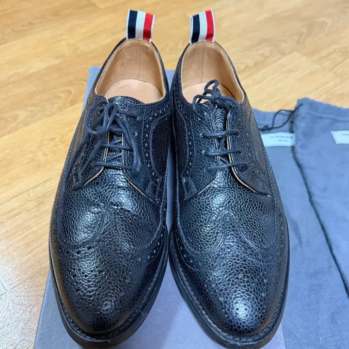 [BUNJANG] Thom Browne Classic Longwing Pebble Grain Wingtip Shoes Black / 38.5 / 톰브라운 클레식 롱윙 페블 그레인 블랙(윙팁)/38.5
