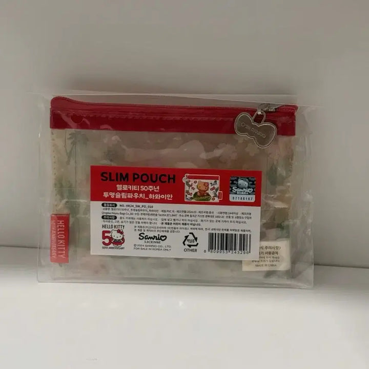 [BUNJANG] Sanrio Hello Kitty 50th Anniversary Hawaiian Transparent Slim Pouch / 산리오 키티 50주년 투명 슬림 파우치 하와이안