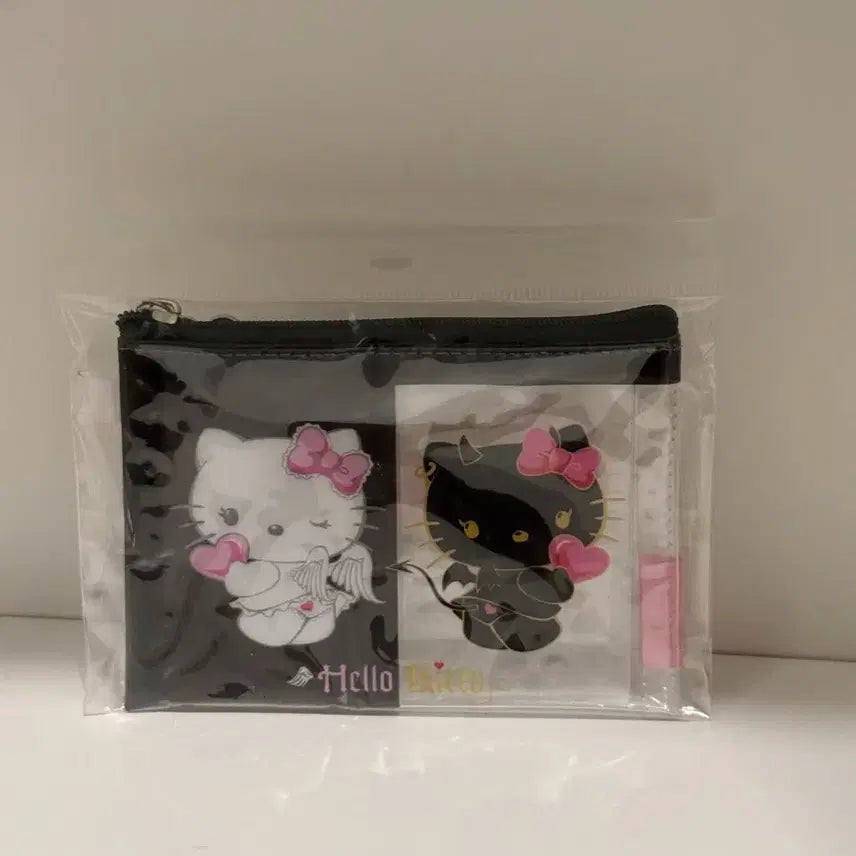 [BUNJANG] Sanrio Hello Kitty 50th Anniversary Angel &amp; Devil Transparent Slim Pouch (Sealed) / 산리오 키티 50주년 투명 슬림 파우치 천사악마 미개봉