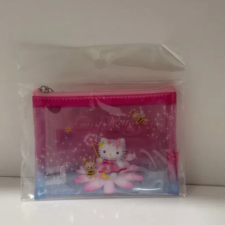 [BUNJANG] Sanrio Kitty 50th Anniversary Fairy Slim Clear Pouch (Sealed) / 산리오 키티 50주년 투명 슬림 파우치 페어리 미개봉 판매
