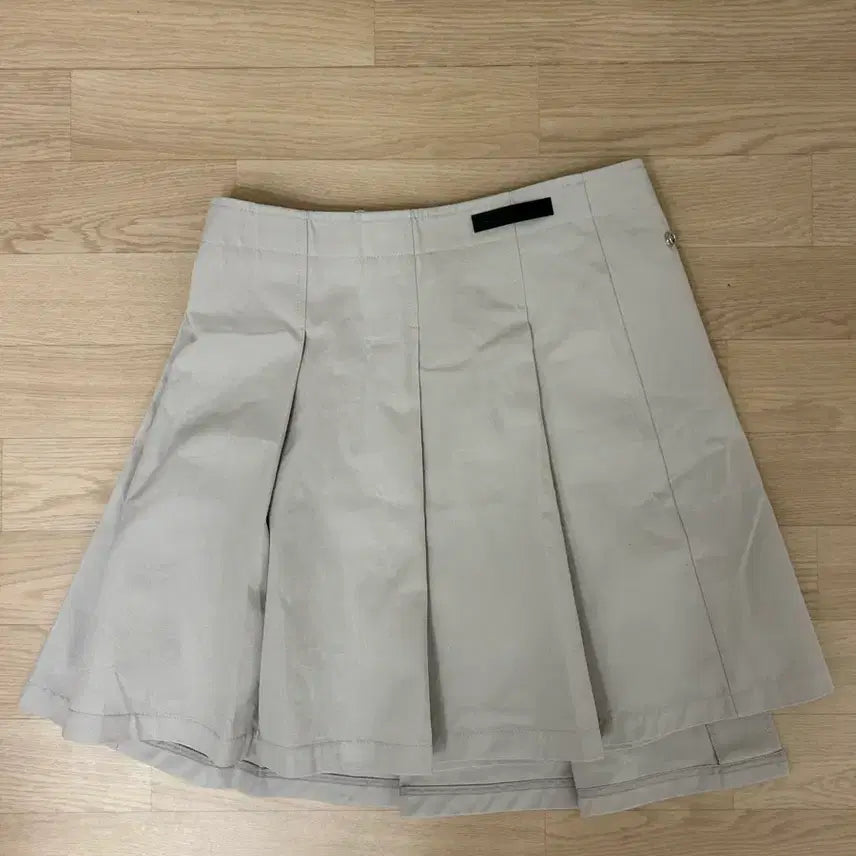 [BUNJANG] Fortea Snap Wrap Pleats Skirt - Beige / 포르테나 SNAP WRAP SOLID PLEATS SKIRT-BEIGE